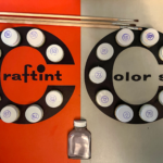 Vintage Craftint color set with labeled paint jars and artist brushes